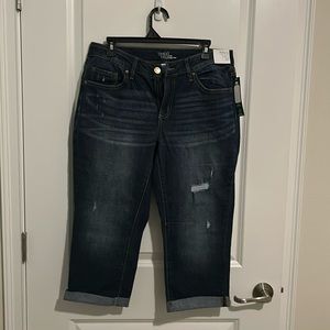 Capri slightly distressed jeans. New with tags size 14.